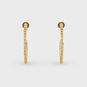 Claudeen Golden Tusk Earrings